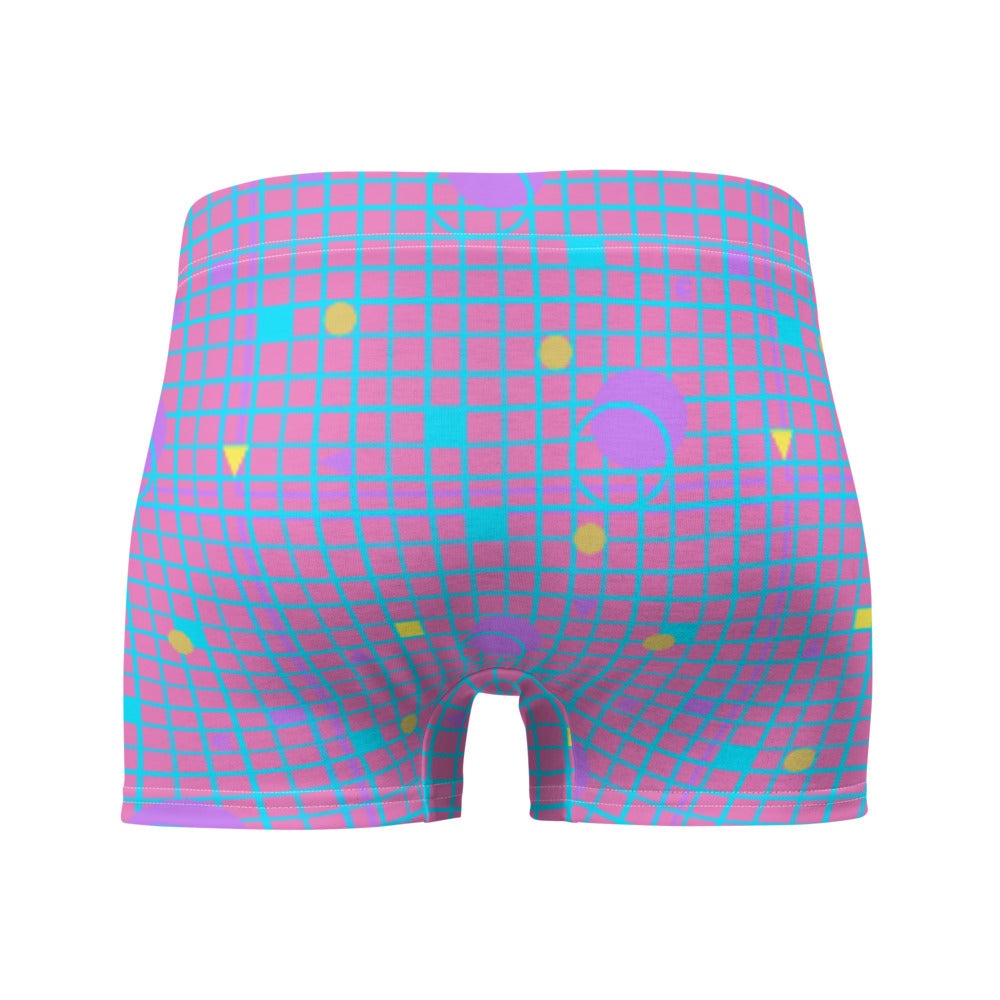 Harajuku geometric patterned men's boxers briefs in mauve, pink, blue and yellow, consisting of a grid background in mauve and pink and 80s Memphis design on these men's boxer briefs by BillingtonPix