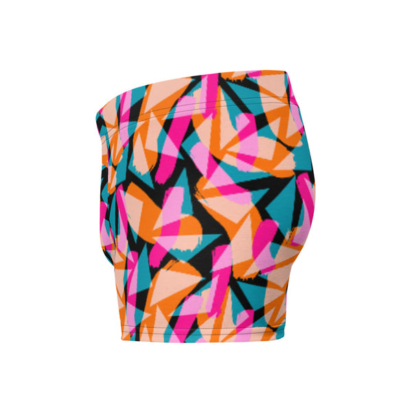 Harajuku patterned LGBT boxer briefs with vibrant geometric and abstract tones of pink, orange and turquoise against a black background on these men's boxers by BillingtonPix