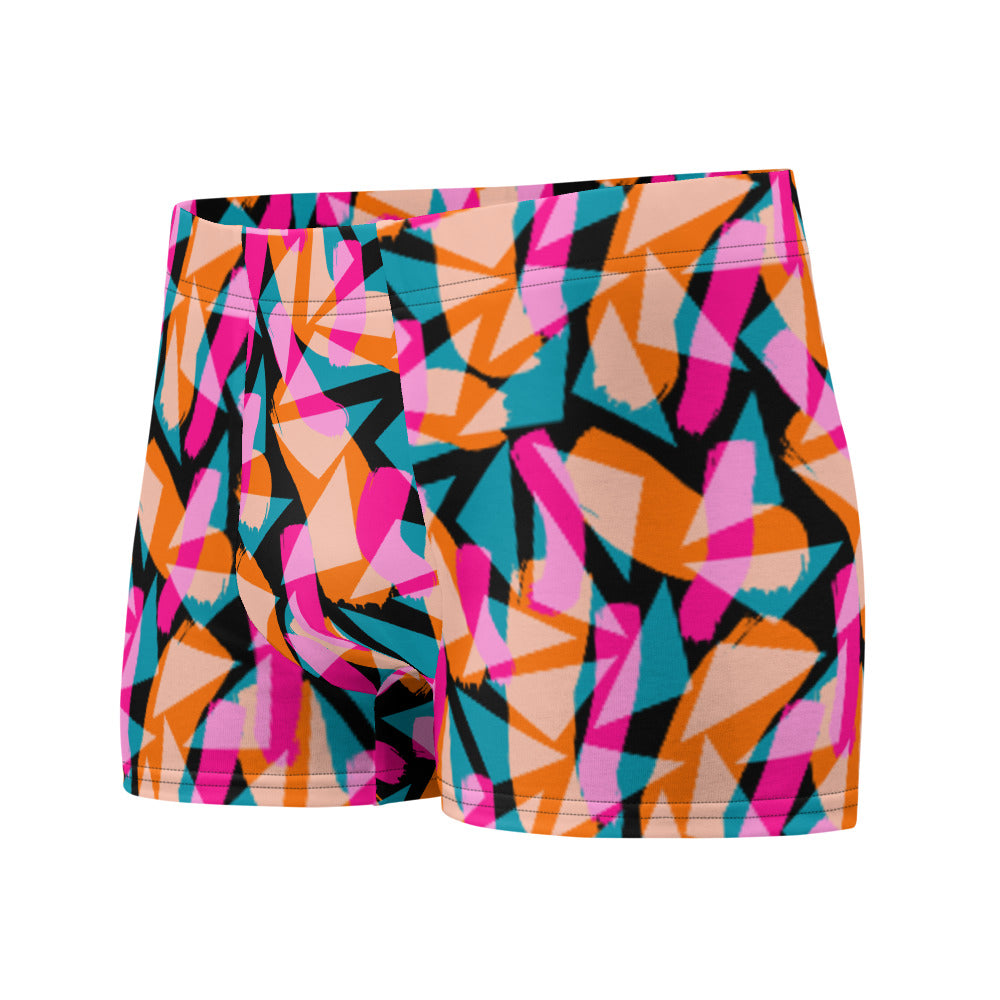 Harajuku patterned LGBT boxer briefs with vibrant geometric and abstract tones of pink, orange and turquoise against a black background on these men's boxers by BillingtonPix