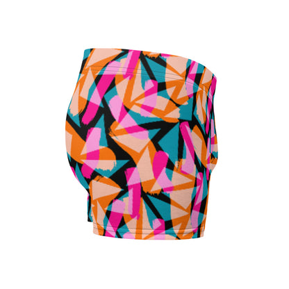 Harajuku patterned LGBT boxer briefs with vibrant geometric and abstract tones of pink, orange and turquoise against a black background on these men's boxers by BillingtonPix