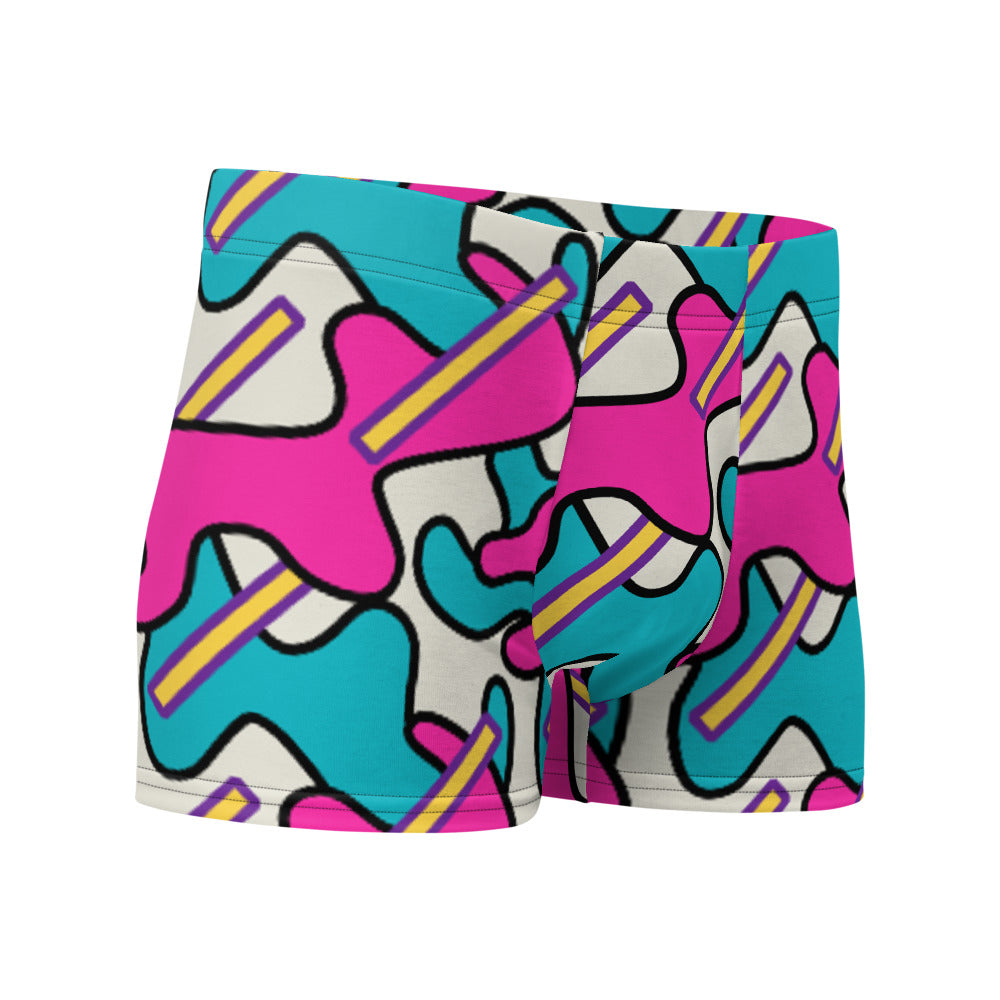 Men's patterned boxer briefs in pink, turquoise, yellow and purple curvy and stick shapes against a cream background on this men's underwear by BillingtonPix