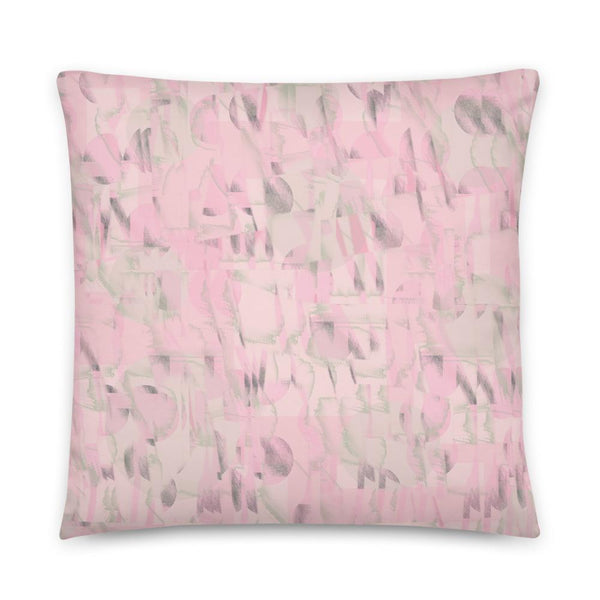 Pink and green pastel tones come together to create a soft contemporary retro patterned sofa cushion or pillow, with hints of 80s Memphis abstract geometric shapes.