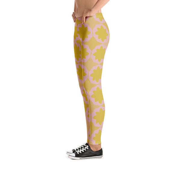 These cheeky, nude-toned and comfortable Mid-Century Modern style leggings / yoga pants consist of a colorful, abstract geometric floral design in pink and yellow/orange tones