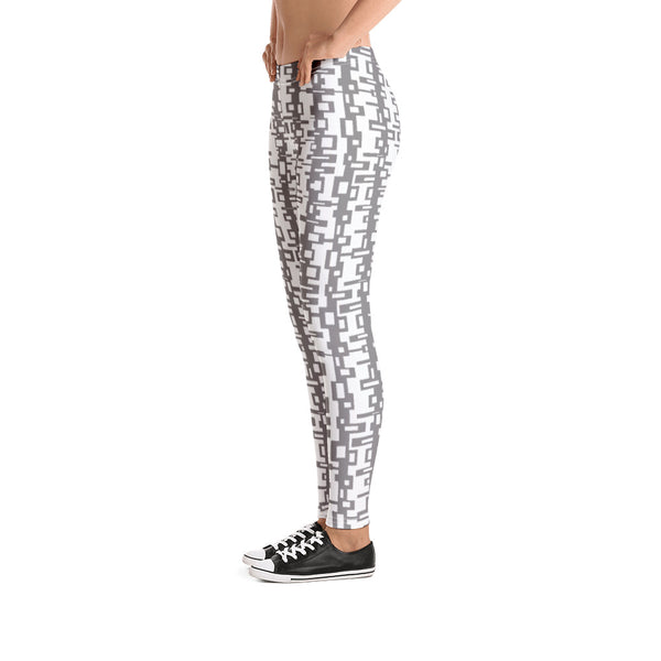 The retro futuristic style design printed onto these leggings consists of a geometric tangled rectangle pattern in grey on a white background