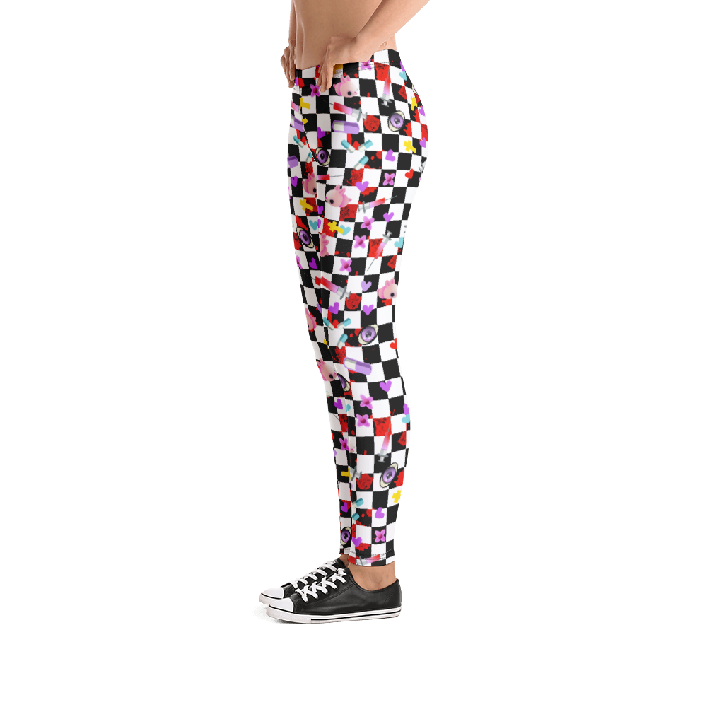 Yami Kawaii Harajuku Anime design women's leggings with a black and white chequered background, containing a number of Menhera Kei and Pop Kei references such as kawaii pink mice, yellow crosses, pastel goth spooky eyes, splatters of blood, hearts and cute looking pills. These gym leggings or running tights for women are something you might want to wear as festival leggings or rave fashion. Design by BillingtonPix