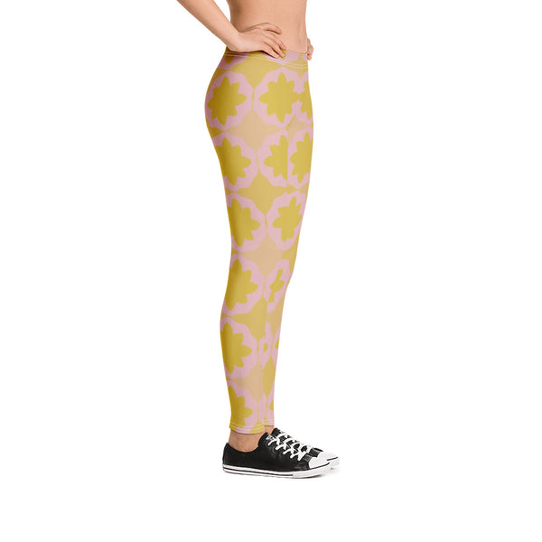 These cheeky, nude-toned and comfortable Mid-Century Modern style leggings / yoga pants consist of a colorful, abstract geometric floral design in pink and yellow/orange tones