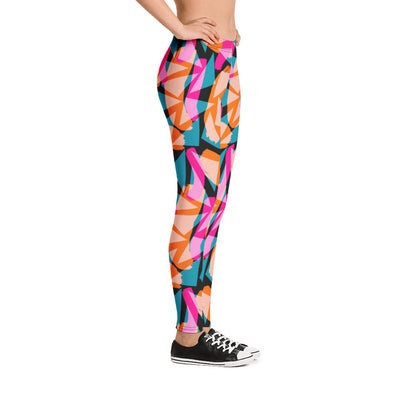 Geometric patterned 90s Memphis design women's gym leggings athleisure streetwear fashion in colorful tones of pink, turquoise green and orange against a black background on this Harajuku design running tights for women by BillingtonPix