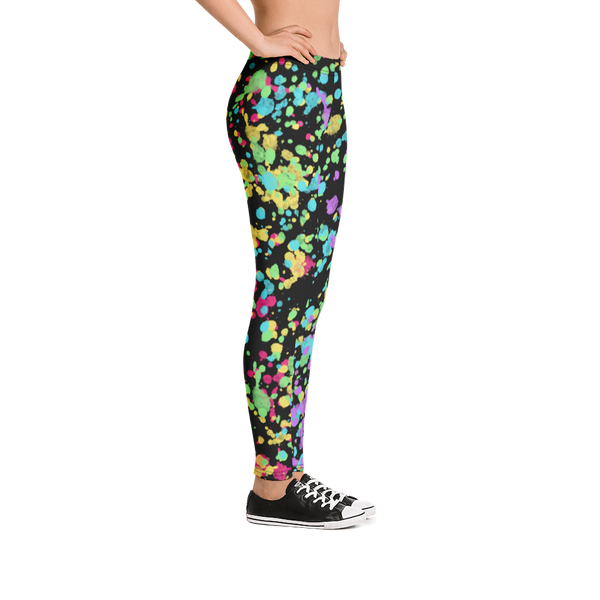 LGBTQ Gay Pride Rainbow Flag ink splats gym leggings for women with red, yellow, blue., green and purple splatters against a black background on these unique and best running tights, Gay Pride and festival leggings for women