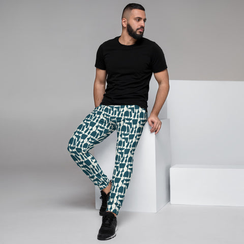Teal and cream geometric patterned men's joggers by BillingtonPix