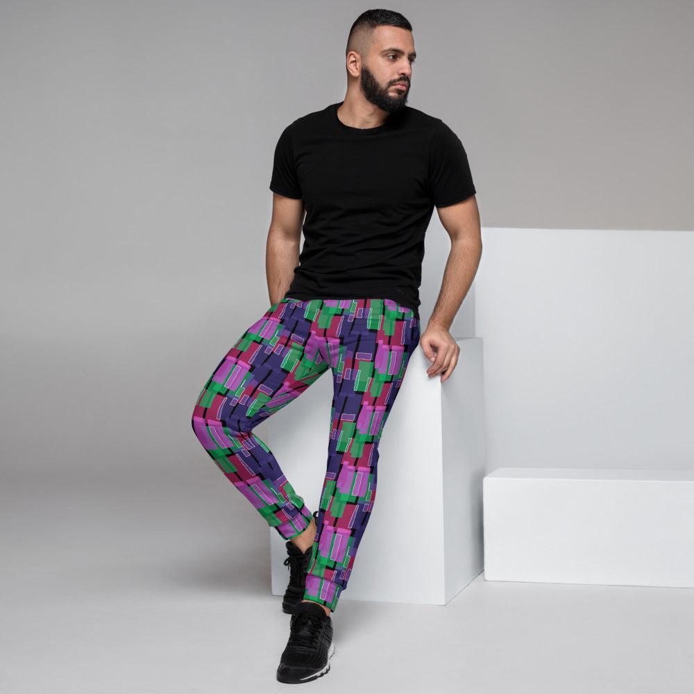 Striking retro geometric patterned joggers in purple, pink and green shapes on a black background joggers for lounging, gym or streetwear by BillingtonPix