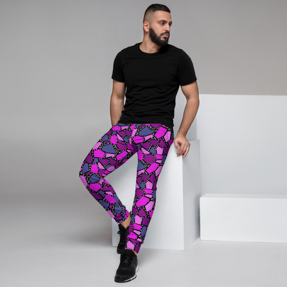 Vibrant 90s style colourful tones and geometric shapes with white dots on a black background on these cotton joggers for lounging, jogging, squatting, streetwear fashion by BillingtonPix