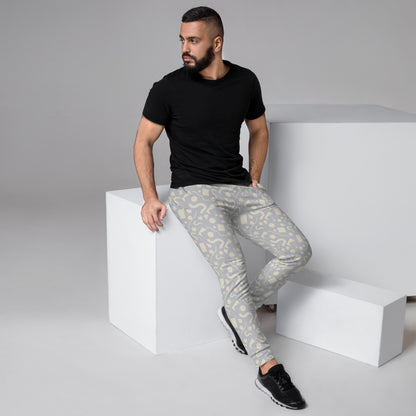 Silver-grey and cream patterned men's joggers in a retro 90s Memphis geometric style by BillingtonPix