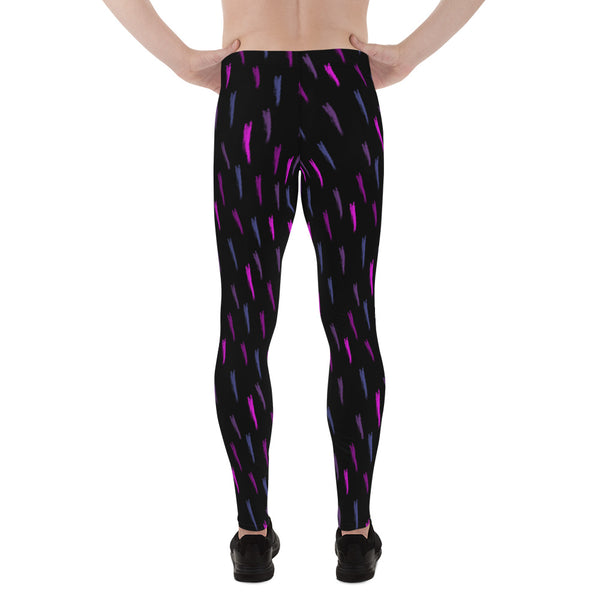 90s style pink, purple and blue daubs on a black background on these retro style leggings for men or meggings by BillingtonPix