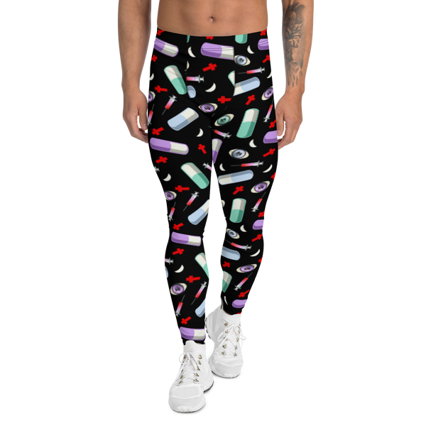 Dark Pastel Goth and Menhera Kei fashion inspired men's leggings with a Japanese Harajuku goth and medical inspired sublimation pattern of pills, syringes, eyeballs, crosses and moons in a spooky pattern against a black background on these meggings by BillingtonPix