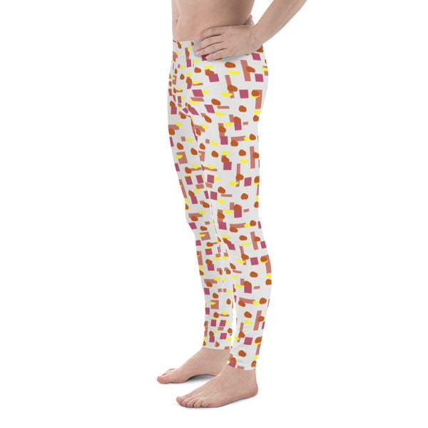 The vintage style graphic design printed onto these meggings consists of colourful overlapping geometric blocks in pink, orange and yellow against a soft stone coloured background