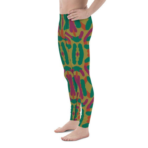Muted tones of purple, green and orange against a mustard background with abstract mirrored shapes on these unique colourful workout leggings for men by BillingtonPix