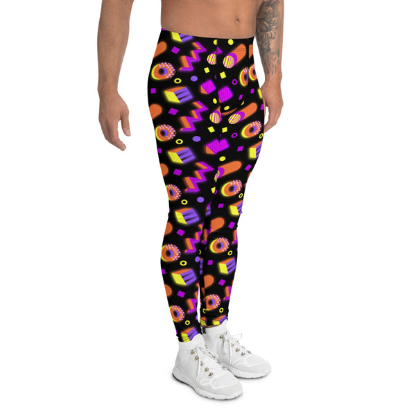 80s Memphis style meggings or men's leggings in a colourful 3 dimensional geometric neon shapes pattern against a black background. These men's running tights are bold and crazy patterned, by BillingtonPix