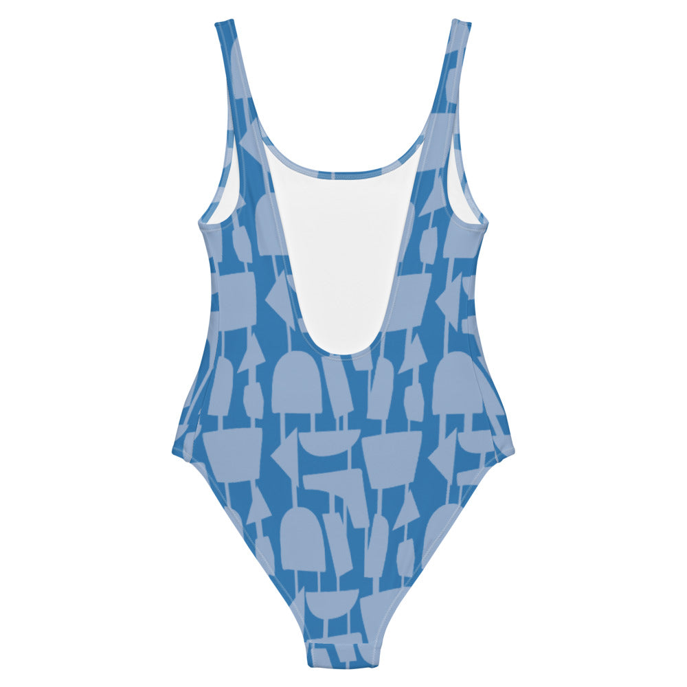 This cheeky, stylish and comfortable, abstract design patterned swimsuit is entitled Forever Connected and consists of a colorful, abstract shapes, connected by vertical lines, against a French blue background