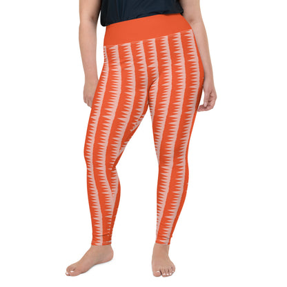 This Mid-Century Modern style plus size leggings pattern consists of colorful pink jagged columns of geometric triangular shapes stacked upon each other like columns against an orange red background