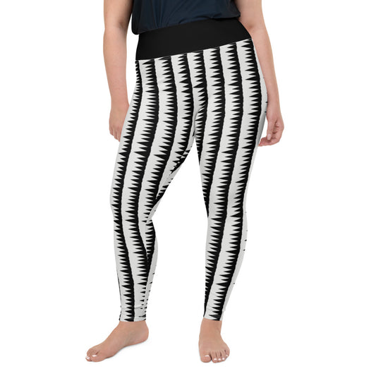 These Mid-Century Modern style plus size leggings pattern consists of black jagged columns of geometric triangular shapes stacked upon each other like columns against a pale cream background. A black high waistband completes the look.