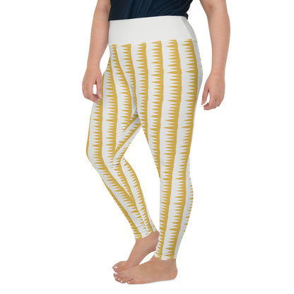 This Mid-Century Modern style plus size leggings pattern consists of colorful mustard yellow jagged columns of geometric triangular shapes stacked upon each other like columns against a pale cream background