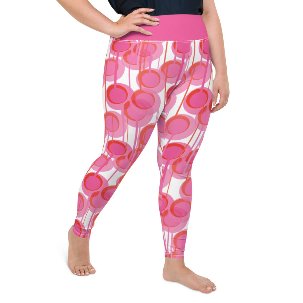 These vintage mid century modern style colourful leggings consists of pink concentric circles and connecting vertical lines against a white background. A deep pink coloured high waistband completes the look.