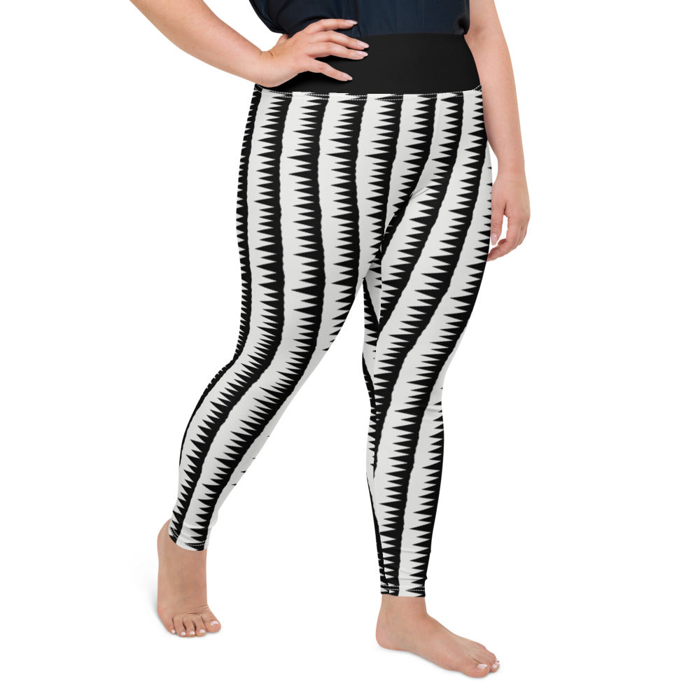 These Mid-Century Modern style plus size leggings pattern consists of black jagged columns of geometric triangular shapes stacked upon each other like columns against a pale cream background. A black high waistband completes the look.