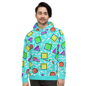 Retro style 80s Memphis design hoodie pullover with colourful rainbow primary colors in geometric shapes squares, circles. triangles with a random white pattern below all over a turquoise blue background on this best athleisure relaxed fit hoodie by BillingtonPix