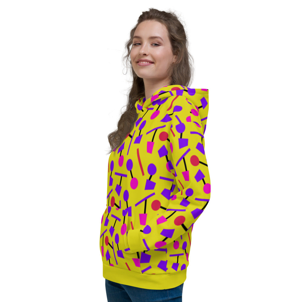 Yellow hoodie pullover in an 80s Memphis style design with purple, pink and black geometric shapes on this hoodie by BillingtonPix