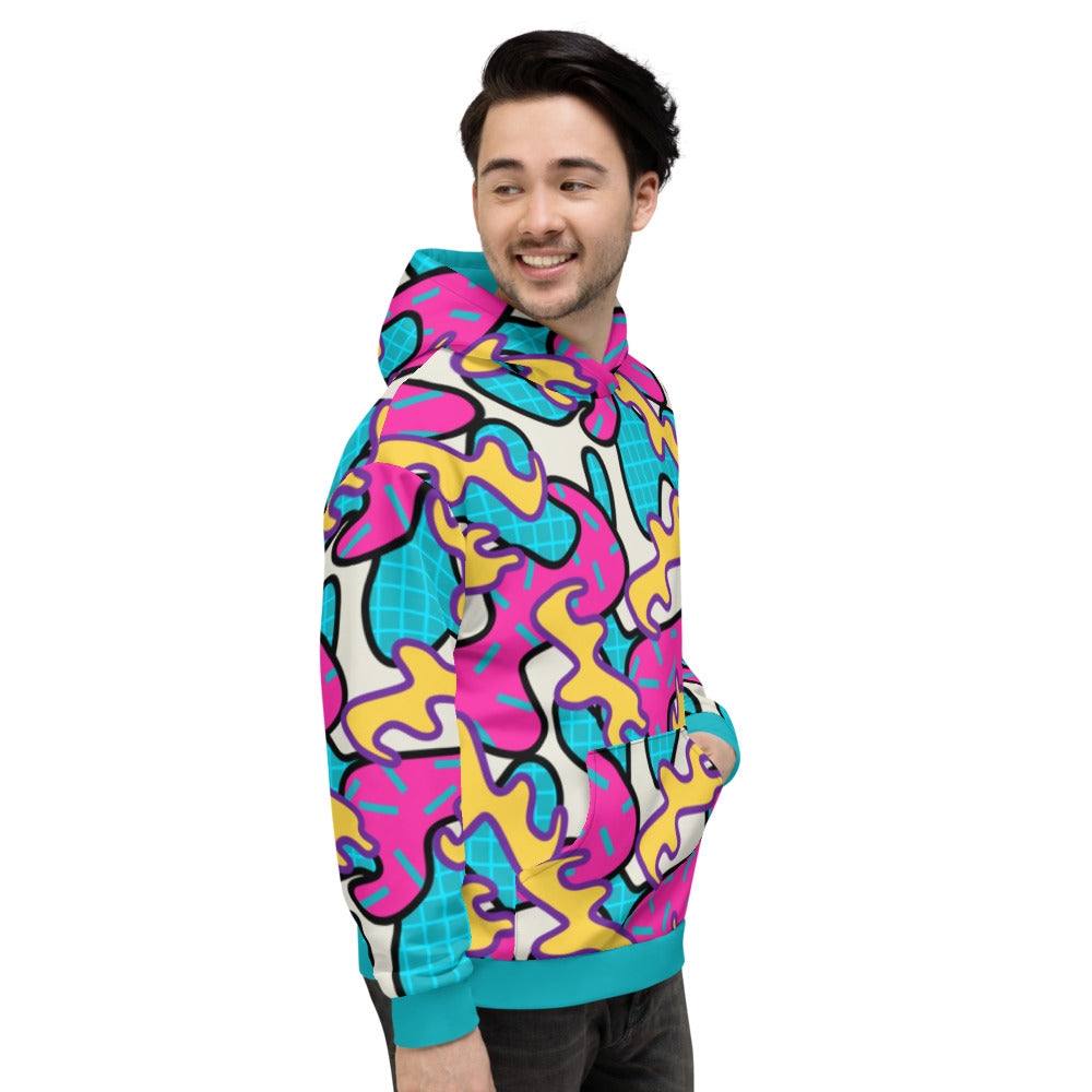 Retro 80s Memphis style unisex hoodie with a curvy pattern of pink, turquoise and yellow shapes and a turquoise trim along the waist and cuffs with turquoise lining inside the hood, by BillingtonPix