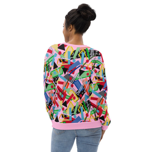 80s memphis style all over print sweatshirt in pink with geometric shapes in a crazy pattern like an arcade carpet. Fun sweater top in green, blue, red and orange two dimensional shapes and colors.