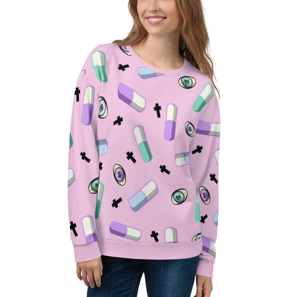 Pink Yami Kawaii clothing with Menhere Kei symbols of pills, crosses and colourful eyeballs provide a juxtaposition of cute with darker symbols on this pink Harajuku sweatshirt or sweater by BillingtonPix