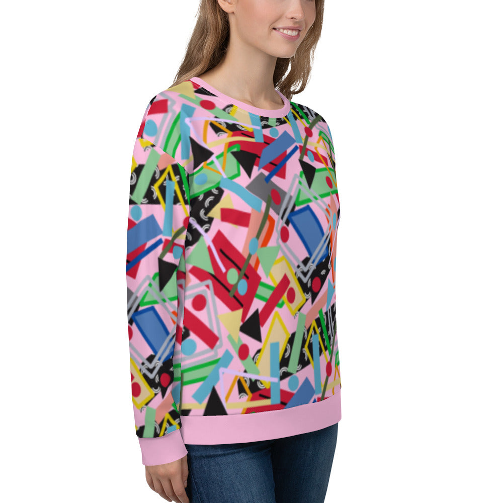 80s memphis style all over print sweatshirt in pink with geometric shapes in a crazy pattern like an arcade carpet. Fun sweater top in green, blue, red and orange two dimensional shapes and colors.