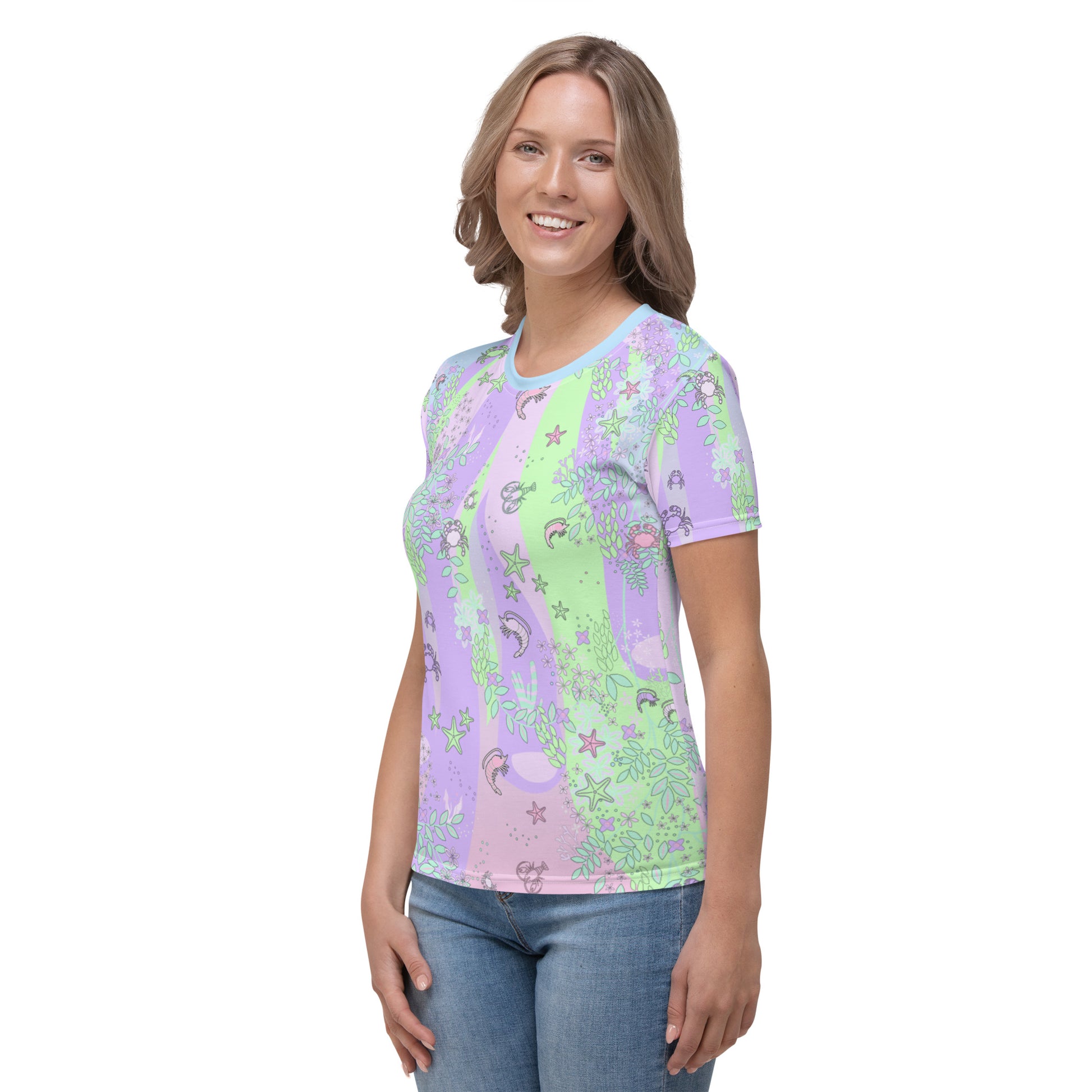 Ocean blush crustaceancore all over print sublimation t-shirt for women with a pattern of sea critters in a stripy background of pastel pink, blue, green and pink. Womens short sleeved with crew neck tee shirt by BillingtonPix