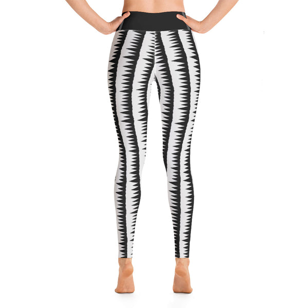 This Midcentury Modern style yoga leggings pattern consists of black jagged columns of geometric triangular shapes stacked upon each other like columns against a pale grey background