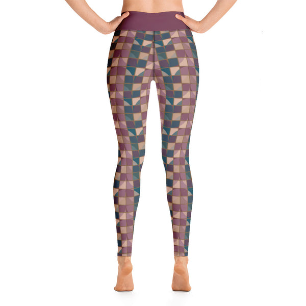 These yoga leggings consist of a mosaic pattern of abstract geometric shapes in purple and teal providing an almost gothic feel