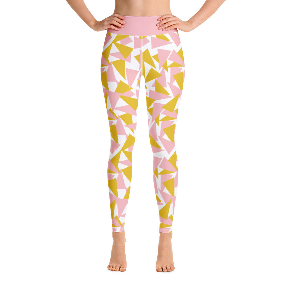 This Mid-Century Modern style leggings pattern consists of colorful triangle shapes in pink and orange on a white background. The high waistband is kept simple, picking out the cute pink color in these distinctive patterned yoga tights