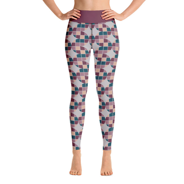 These Mid-Century Modern style yoga leggings consists of a mosaic pattern of burgundy, teal, pink and cream in the abstract shape of descending serpents against pale grey background. The high waistband is kept simple, picking out the burgundy colour in these distinctive patterned yoga tights