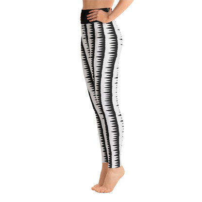 This Mid-Century Modern style yoga leggings pattern consists of black jagged columns of geometric triangular shapes stacked upon each other like columns against a pale grey background