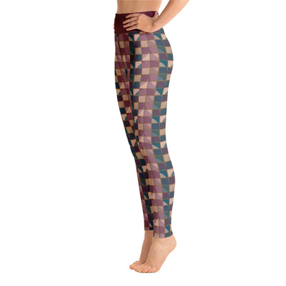 These yoga leggings consist of a mosaic pattern of abstract geometric shapes in purple and teal providing an almost gothic feel