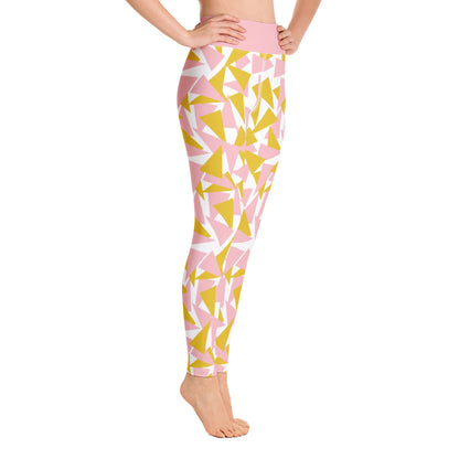 This Mid-Century Modern style leggings pattern consists of colorful triangle shapes in pink and orange on a white background. The high waistband is kept simple, picking out the cute pink color in these distinctive patterned yoga tights