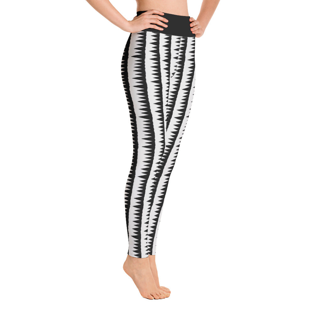 This Mid-Century Modern style yoga leggings pattern consists of black jagged columns of geometric triangular shapes stacked upon each other like columns against a pale grey background