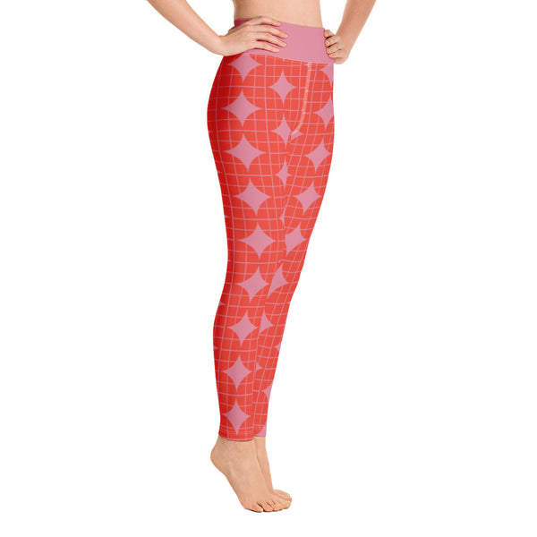 These Mid-Century Modern style yoga leggings consists of a mosaic pattern of orange abstract geometric shapes of descending serpents against pink background. The high waistband is kept simple, picking out the pink colour in these distinctive patterned yoga tights