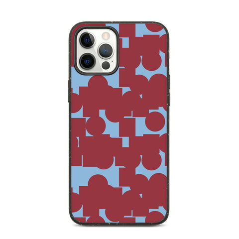 This Mid-Century Modern style phone cover consists of vermillion red colored geometric shapes on a cerulean blue background