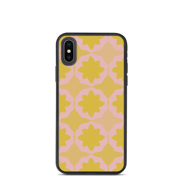 This Mid-Century Modern style biodegradable phone case consists of a colorful, abstract geometric floral design in pink and orange tones
