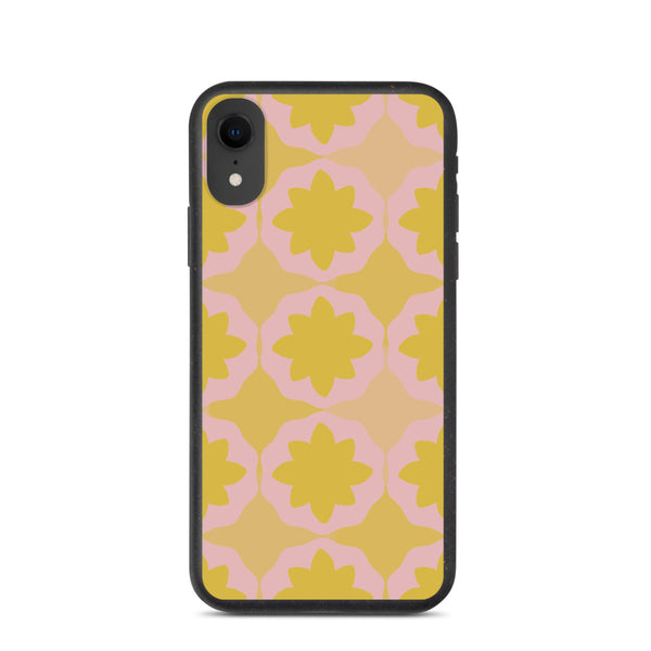 This Mid-Century Modern style biodegradable phone case consists of a colorful, abstract geometric floral design in pink and orange tones