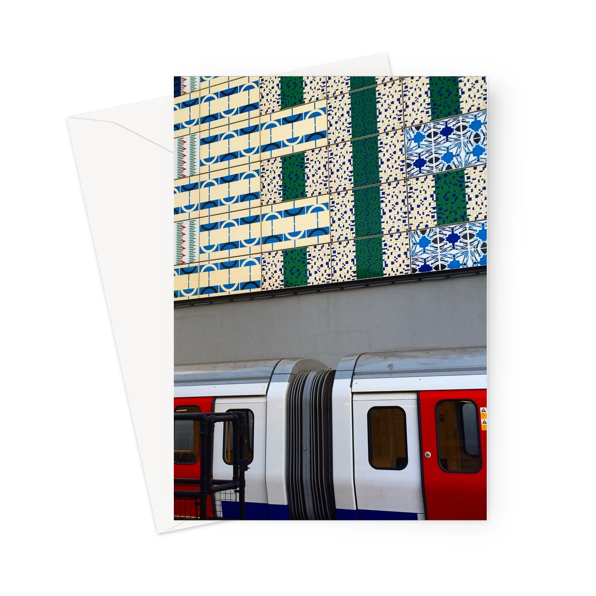 This greeting card shows a London Underground train parked beneath the partial view of a contemporary art work at Edgware Road station.