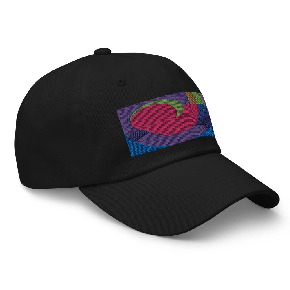 Black dad hat with colorful rectangular logo containing blocks of colors of pink, purple, green and blue, curves and geometric shapes in a mid-century modernist abstract composition