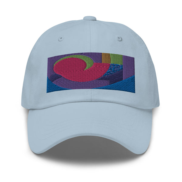 Light blue dad hat with colorful rectangular logo containing blocks of colors of pink, purple, green and blue, curves and geometric shapes in a mid-century modernist abstract composition