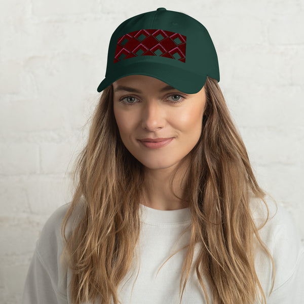 Red diamonds with burgundy and pink tones in this geometric 1960s inspired retro design logo on this dad hat